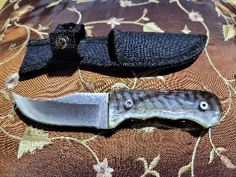 skinner knife with a real mackerel skin handle